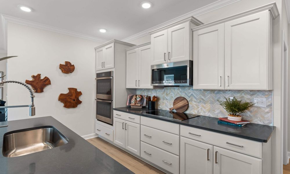 Representative furnished interior of a home built from the The Hibiscus by Chesapeake Homes in Heritage Park at Longs, Longs (Image 8).