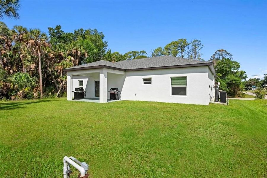 Exterior details and patio area of a home in , North Port (Image 24).