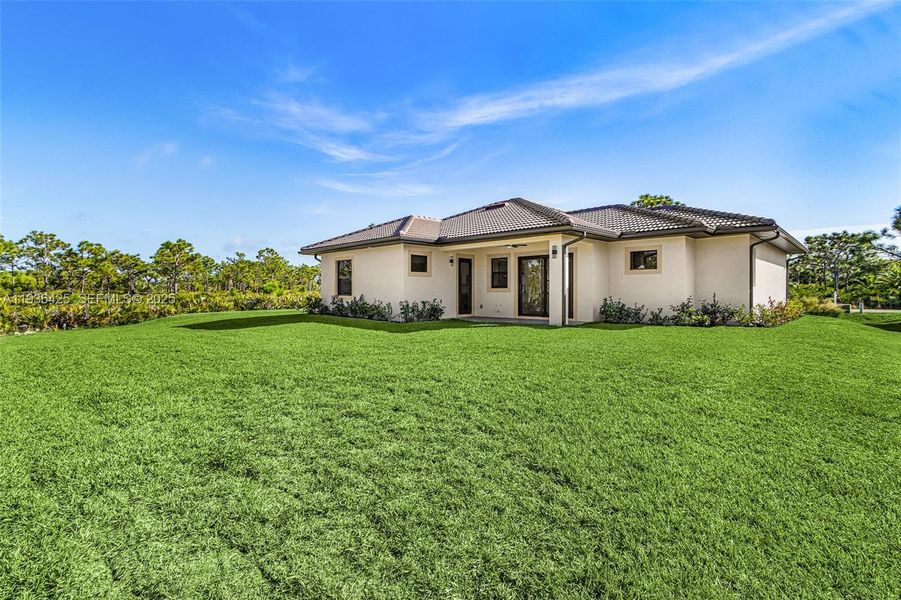 Exterior details and patio area of a home in , Bokeelia (Image 22).