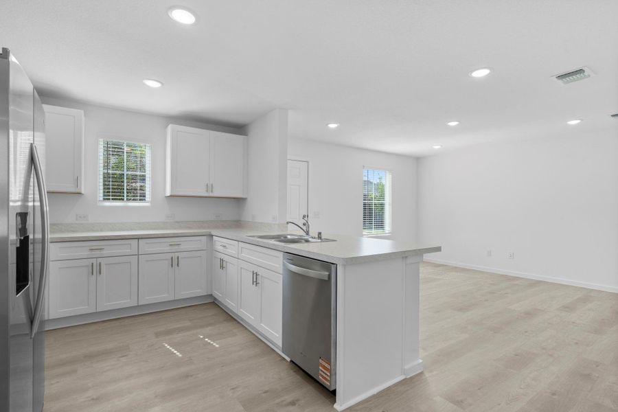 Furnished interior view inside a new home in The Courtyards at Stokesbury, Waller (Image 5).