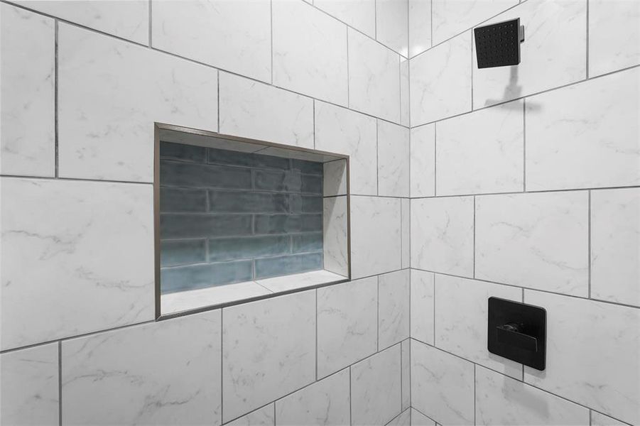 Details featuring tiled shower