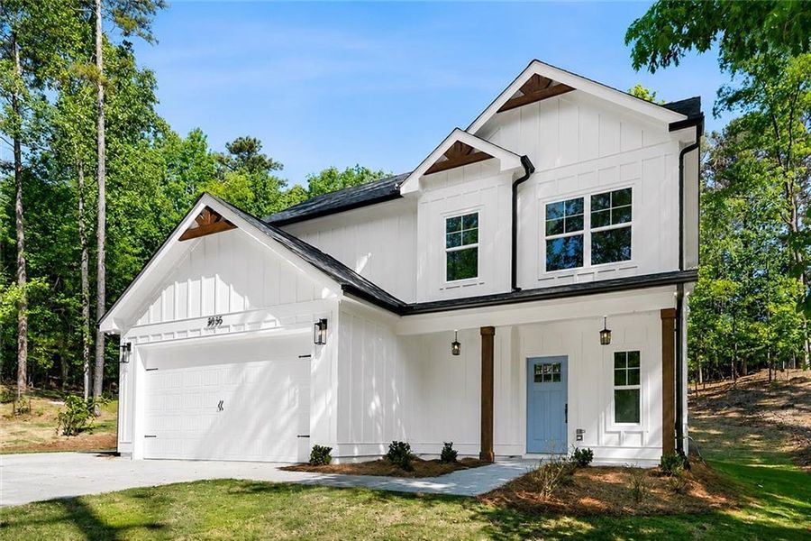 Front exterior of a new home in , Cumming, GA, highlighting curb appeal (Image 25). Front exterior of a new home in , Cumming, GA, highlighting curb appeal (Image 25).