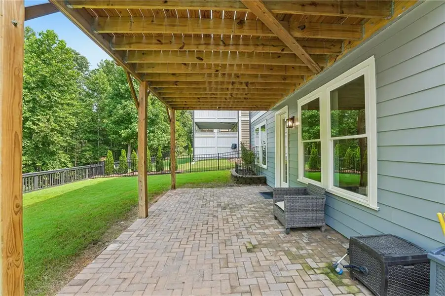 Exterior details and patio area of a home in Lakeside at River Green, Canton (Image 4).
