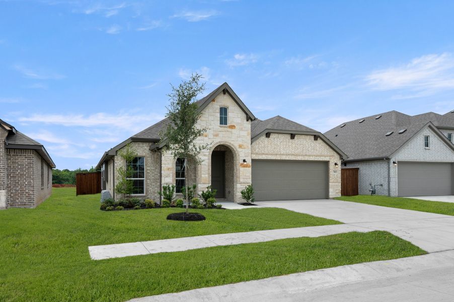 Front exterior of a new home in Meadow Park at The Meadows, Ponder, TX, highlighting curb appeal (Image 2). Front exterior of a new home in Meadow Park at The Meadows, Ponder, TX, highlighting curb appeal (Image 2).