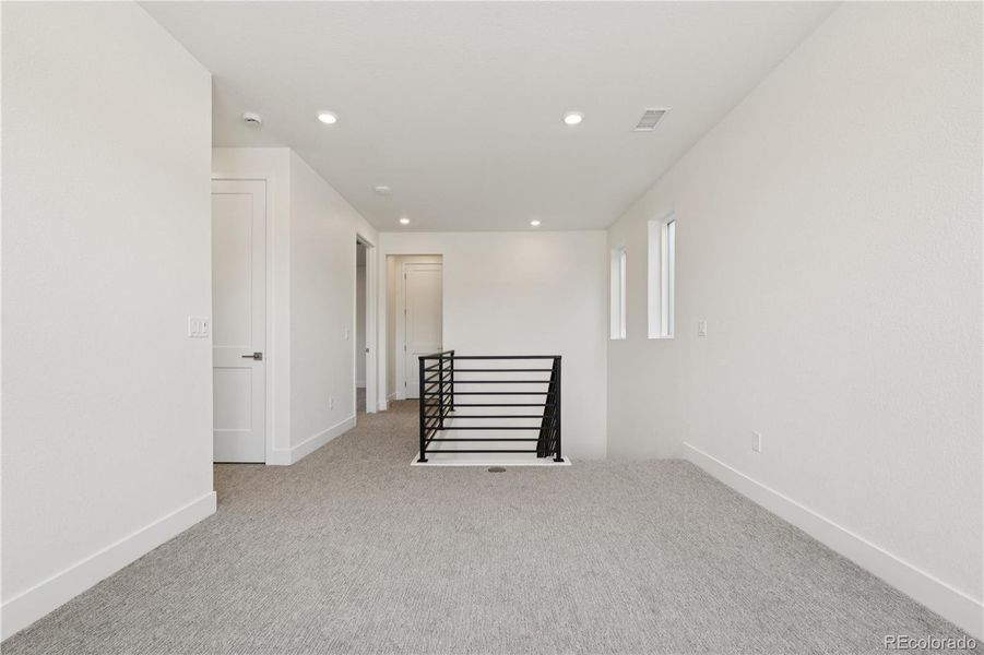 Spacious, unfurnished interior of a new home in Storytellers at Lyric, Lone Tree (Image 38).