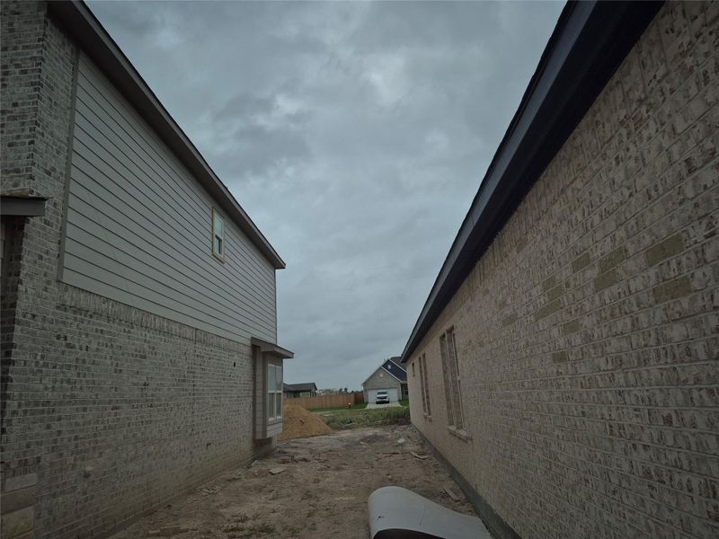 Exterior details and patio area of a home in , Manvel (Image 5).