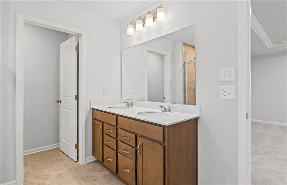 Furnished interior view inside a new home in Watermist at Mirror Lake, Villa Rica (Image 8).