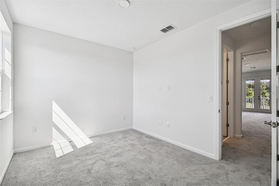 Spacious, unfurnished interior of a new home in Emerson Pointe, Apopka (Image 27).