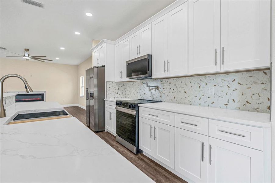 Furnished interior view inside a new home in , Daytona Beach (Image 13).