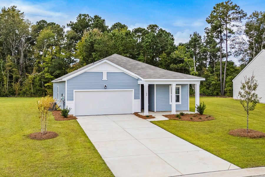 Representative exterior photo of a completed home built from the Prism by Starlight Homes in Watson Hill, Summerville, SC (Image 12).