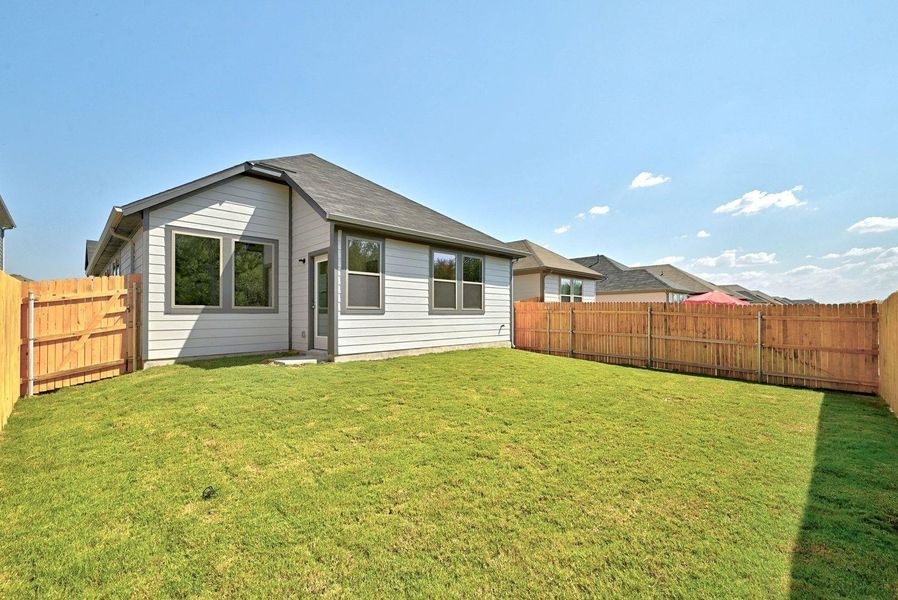 Exterior details and patio area of a home in Trinity Ranch, Elgin (Image 4).