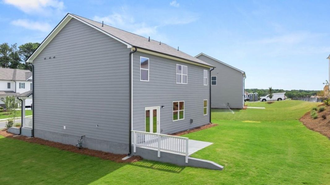 Exterior details and patio area of a home in Liberty Crossing, Braselton (Image 17).