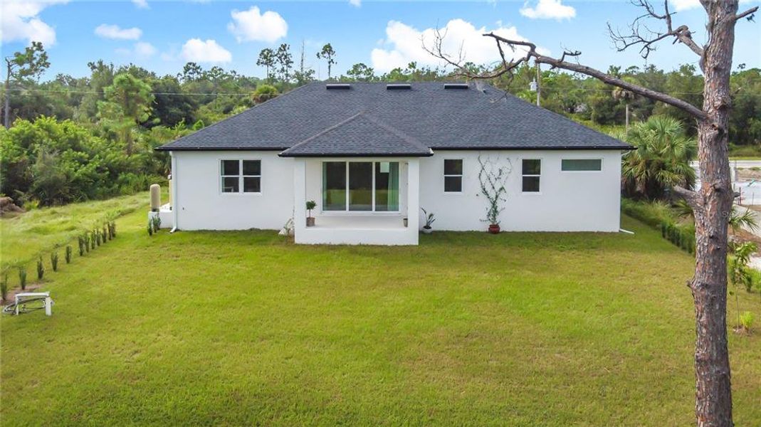 Exterior details and patio area of a home in , Port Charlotte (Image 24).