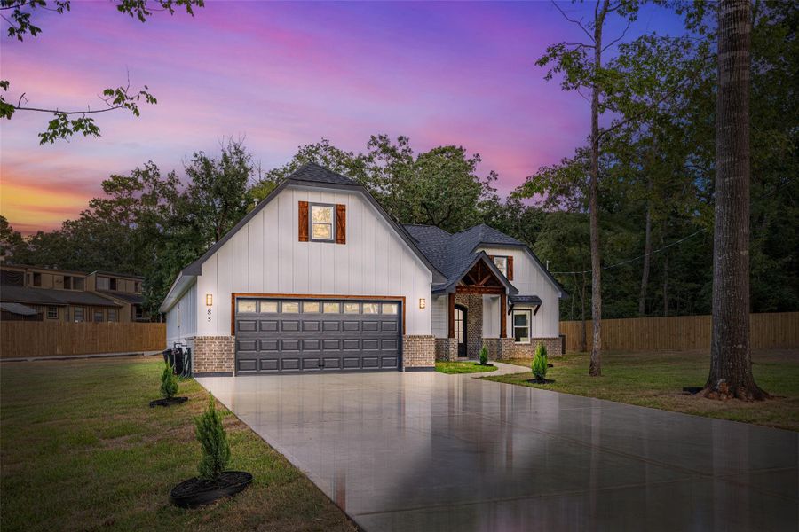 Front exterior of a new home in , Conroe, TX, highlighting curb appeal (Image 19).