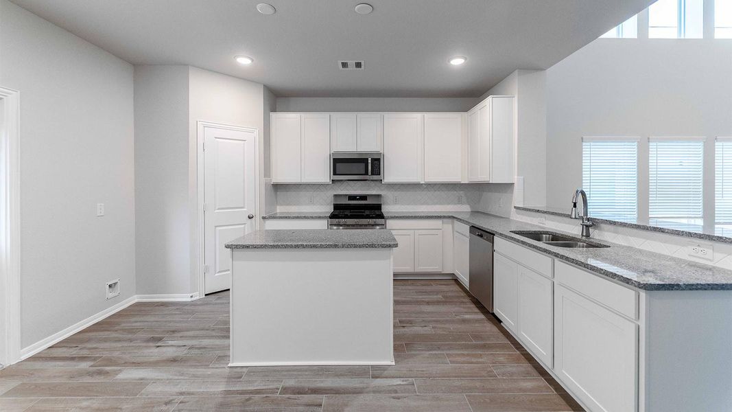 Furnished interior view inside a new home in Pearlbrook, Texas City (Image 1).