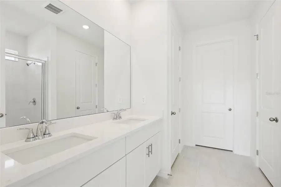 Furnished interior view inside a new home in Coasterra - Reserve Series, Palmetto (Image 8).