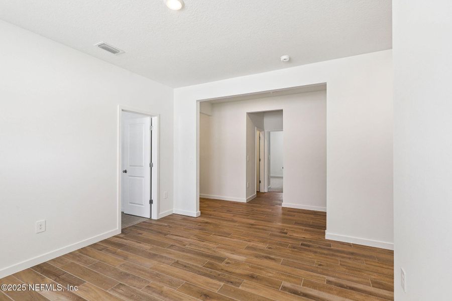 Spacious, unfurnished interior of a new home in Lakes at Bella Lago - Signature Series, Green Cove Springs (Image 12).