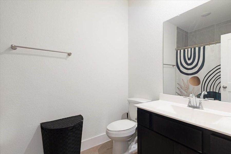 Furnished interior view inside a new home in Meridiana, Iowa Colony (Image 15).