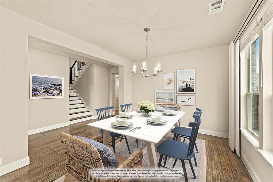 Dining space with dark wood-style flooring, a chandelier, and stairs