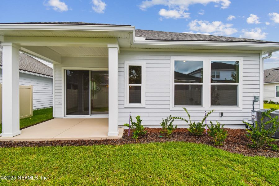 Front exterior of a new home in Seabrook Village 40' Front Entry, Ponte Vedra, FL, highlighting curb appeal (Image 2). Front exterior of a new home in Seabrook Village 40' Front Entry, Ponte Vedra, FL, highlighting curb appeal (Image 2).