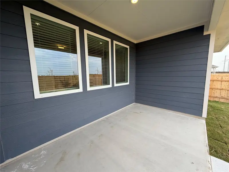 Exterior details and patio area of a home in Willow Springs, Buda (Image 3). Exterior details and patio area of a home in Willow Springs, Buda (Image 3).