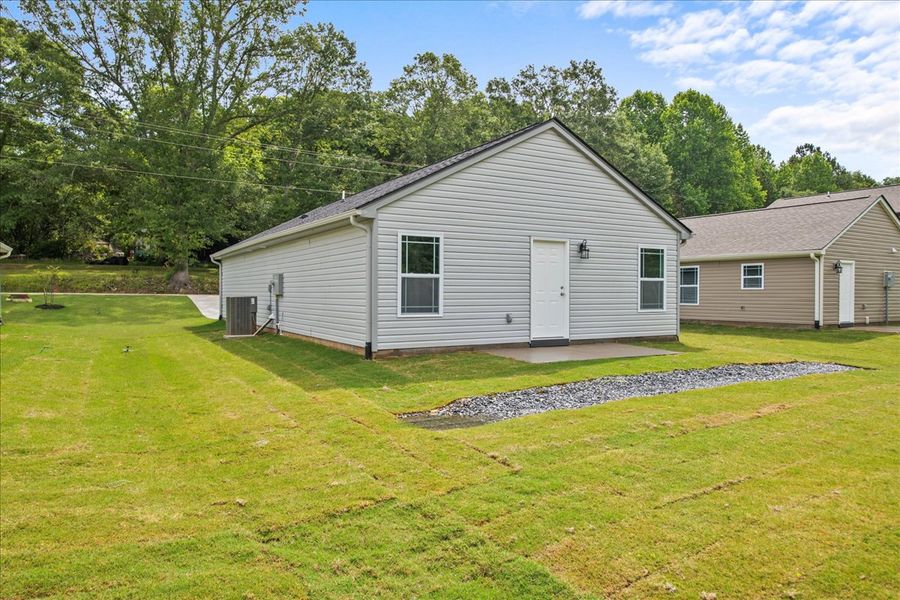 Representative exterior photo of a completed home built from the Lexington by Enchanted Homes in Gentry Place, Spartanburg, SC (Image 2).