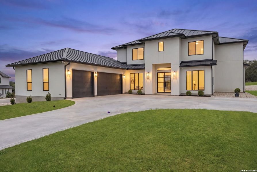 Front exterior of a new home in , Bulverde, TX, highlighting curb appeal (Image 29).