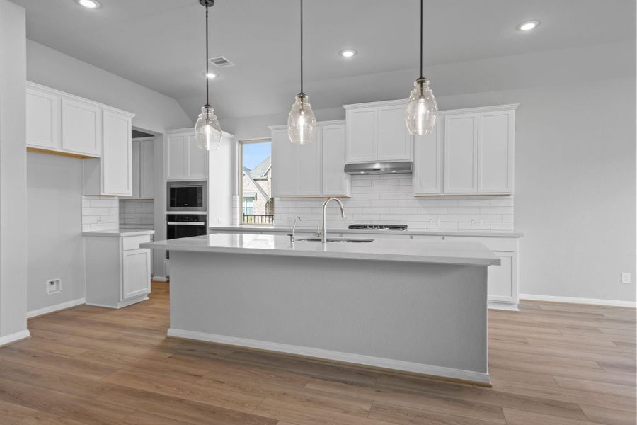 Furnished interior view inside a new home in Bridgeland 55', Cypress (Image 9).