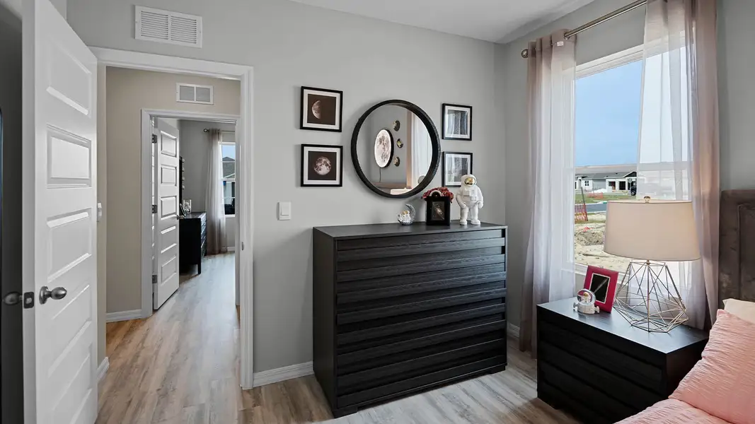 Furnished interior view inside a new home in Harmony at Lake Eloise, Winter Haven (Image 23).