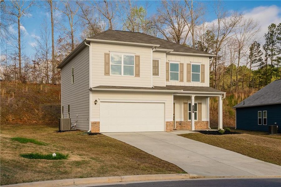 Front exterior of a new home in , Dalton, GA, highlighting curb appeal (Image 23).