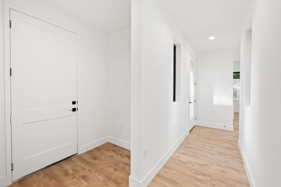 Upstairs hallway carpet-free!