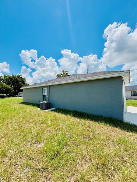 Front exterior of a new home in , Bartow, FL, highlighting curb appeal (Image 16).