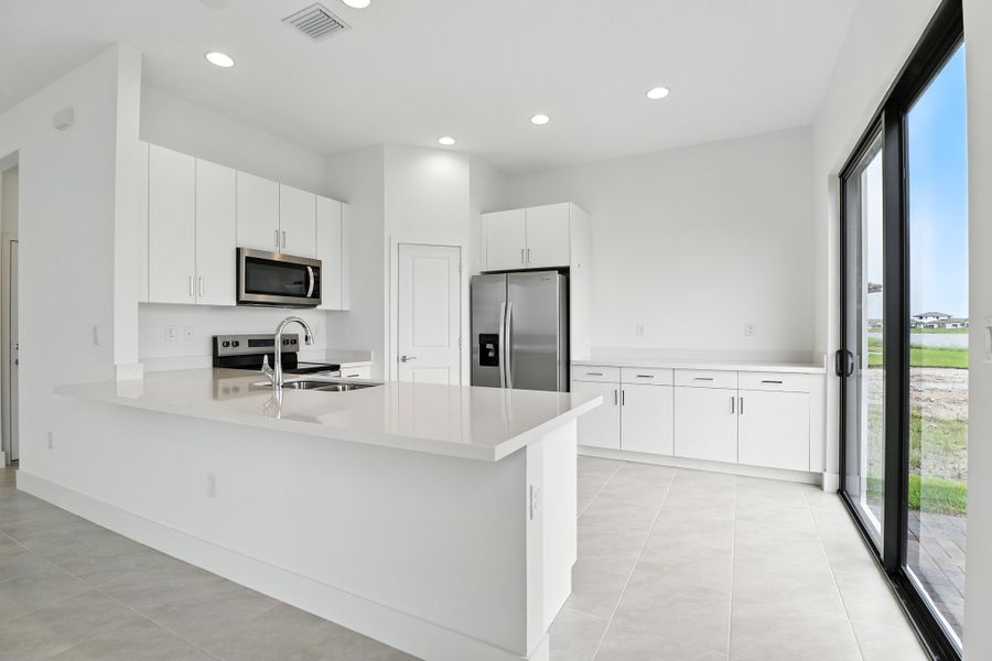 Furnished interior in a model home at Maple Ridge in Ave Maria (Image 17). Furnished interior in a model home at Maple Ridge in Ave Maria (Image 17).