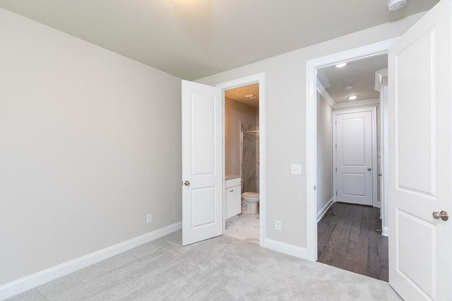 Spacious, unfurnished interior of a new home in Waterhaven, Cumming (Image 25).