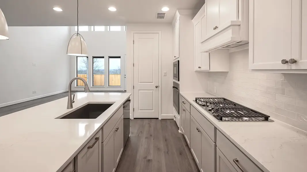 Furnished interior view inside a new home in Crosswinds 50', Kyle (Image 6).