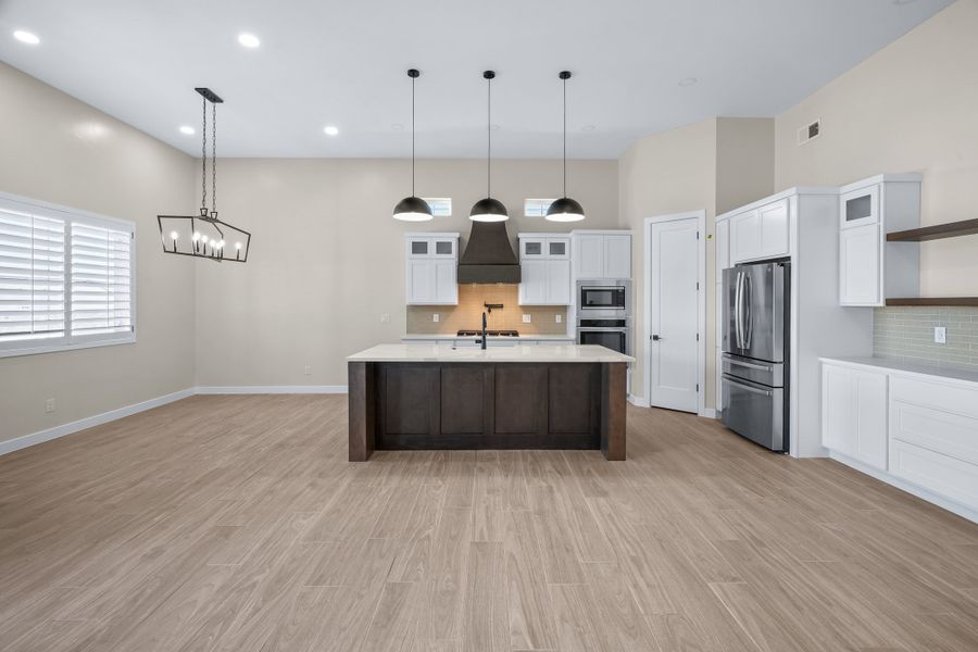 Representative furnished interior of a home built from the Pebble Beach EXT50 by LEH. Homes in Verdancia, El Paso (Image 10).