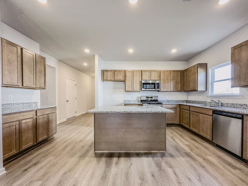 Representative furnished interior of a home built from the The Hampton by Smith Douglas Homes in Enclave at Willis, Willis (Image 9).