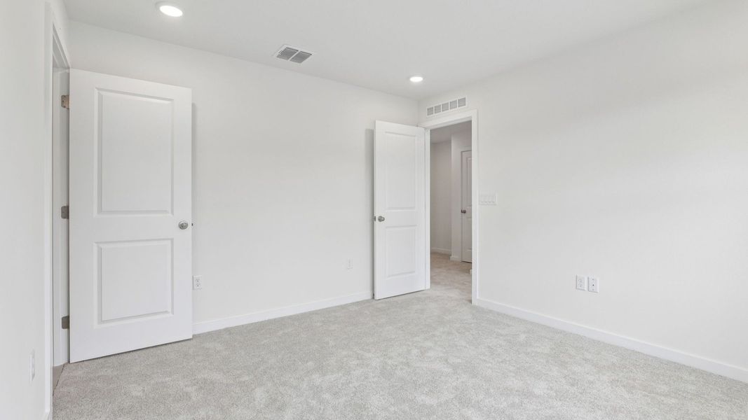 Furnished interior view inside a new home in Cyrene at Harmony, St. Cloud (Image 29).