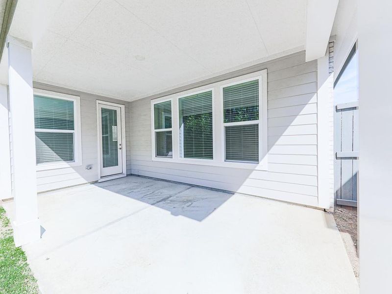 Exterior details and patio area of a home in Glenhaven at Ridgewalk, Woodstock (Image 4).