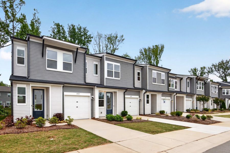 Front exterior of a new home in Fifteen 15 Cannon, Charlotte, NC, highlighting curb appeal (Image 1). Front exterior of a new home in Fifteen 15 Cannon, Charlotte, NC, highlighting curb appeal (Image 1).