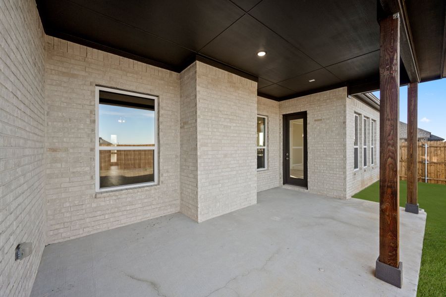 Exterior details and patio area of a home in Timberbrook, Justin (Image 3).