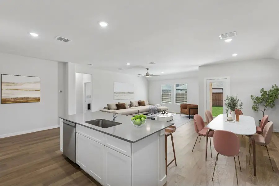 Open Floor Plan in the Harrison home plan by Trophy Signature Homes – REPRESENTATIVE PHOTO Open Floor Plan in the Harrison home plan by Trophy Signature Homes – REPRESENTATIVE PHOTO