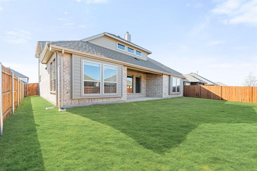 Exterior details and patio area of a home in Timberbrook, Justin (Image 4).