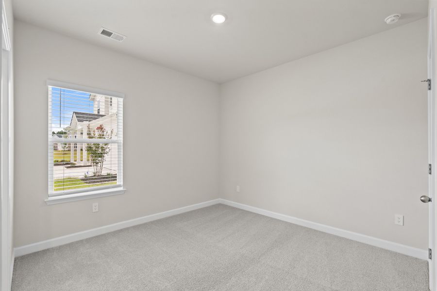 Spacious, unfurnished interior of a new home in Cypress Ridge - The Coastline Series, Longs (Image 25).