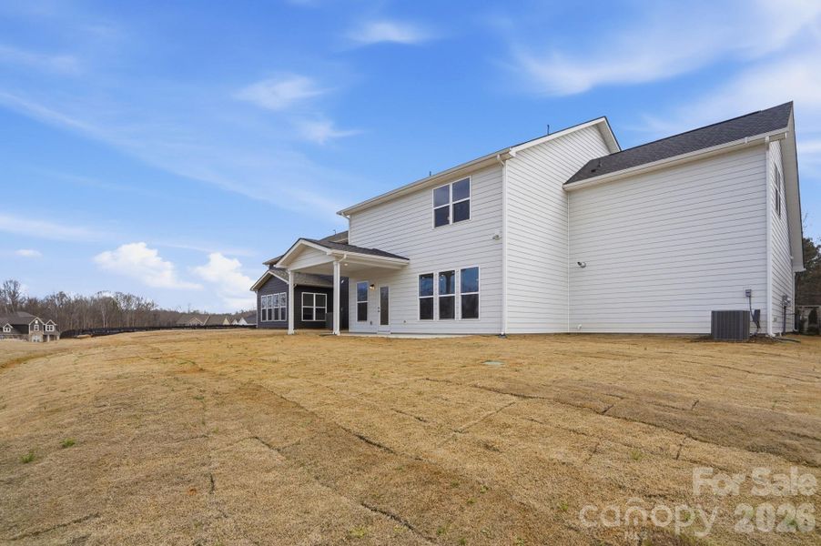Exterior details and patio area of a home in Forest Creek, Waxhaw (Image 23).