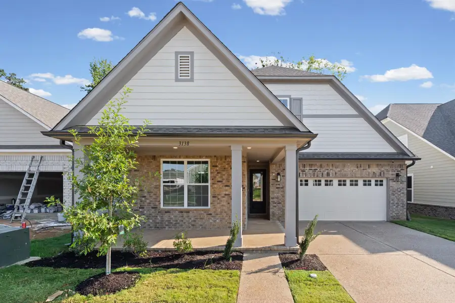 Brick and siding exterior with a covered porch Brick and siding exterior with a covered porch