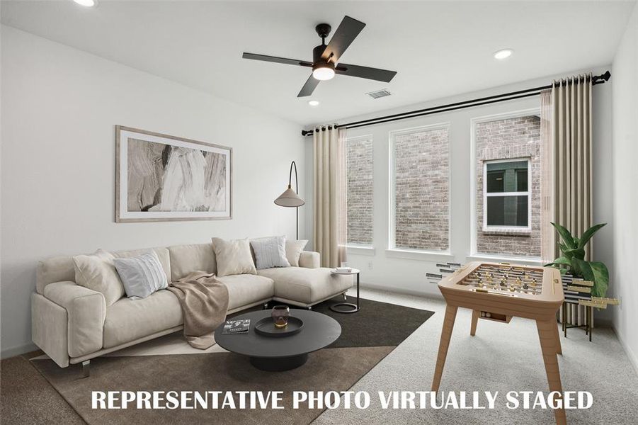 The family fun time never ends in this light filled family room!  REPRESENTATIVE PHOTO VIRTUALLY STAGED