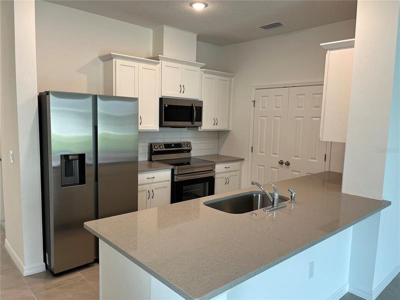 Furnished interior view inside a new home in Marion Ridge, Haines City (Image 5).