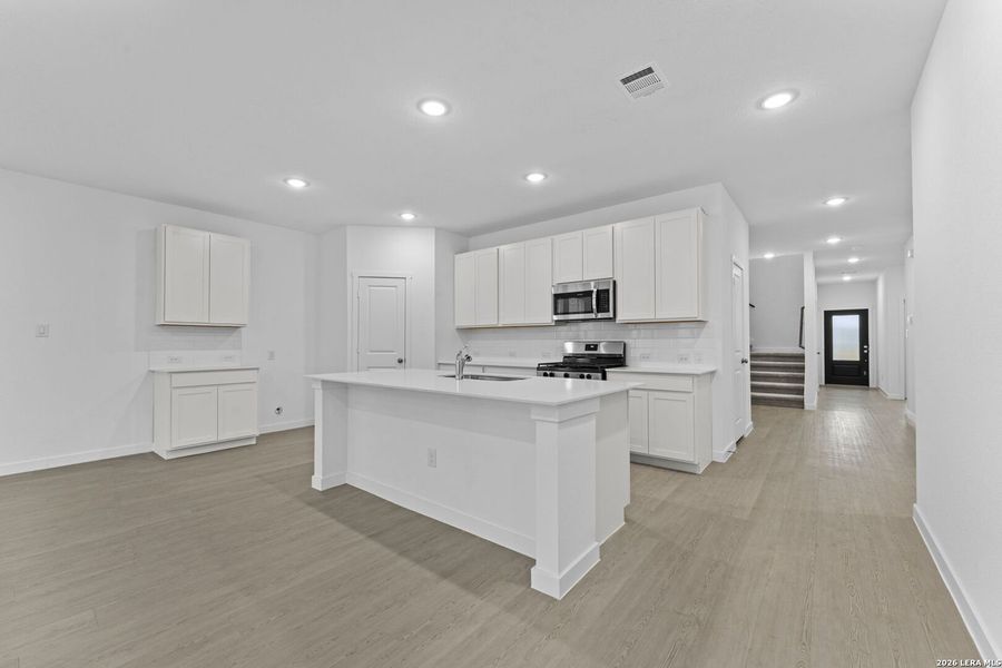 Furnished interior view inside a new home in Sky Ranch, New Braunfels (Image 9).
