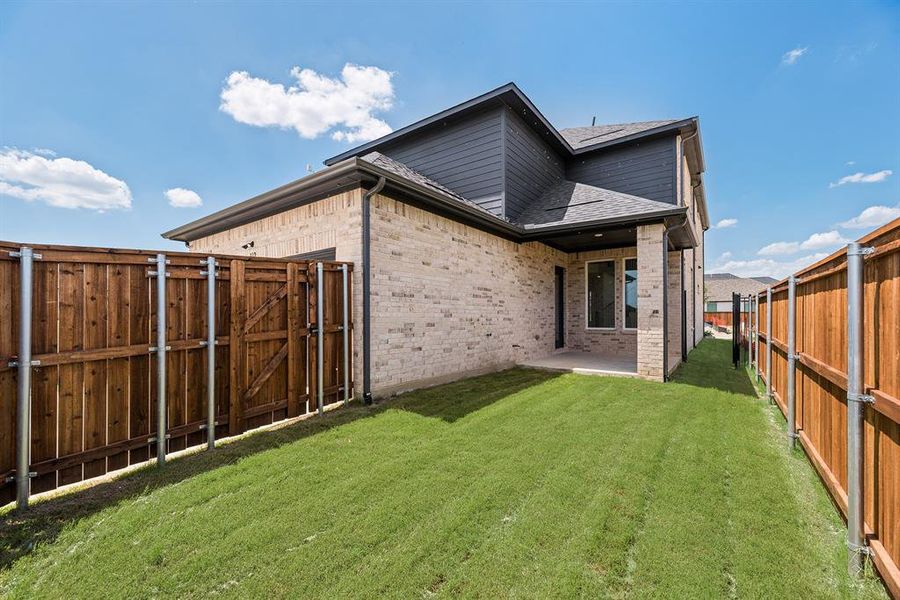 Exterior details and patio area of a home in Cottages of Celina, Celina (Image 4).